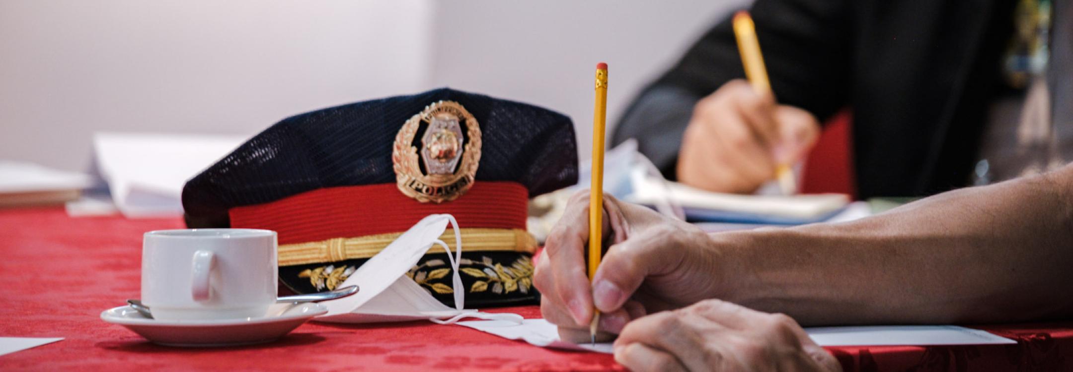 Police officers hat on table